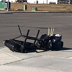 Debris on Street, Sidewalk, Boulevard at 4098 88 Av NE