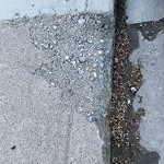 Sidewalk or Curb Repair at 237 25 Av NW