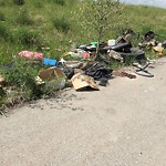 Debris on Street, Sidewalk, Boulevard at 2855 128 Av NE