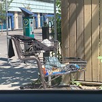 Debris on Street, Sidewalk, Boulevard at 521 13 Av SW