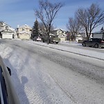 Snow On City Road at 850 Harvest Hills Dr NE