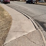 Sidewalk or Curb - Repair at 701 7 Av NE