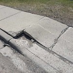 Sidewalk or Curb - Repair at 7531 Macleod Tr SW