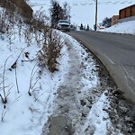 Snow On City-maintained Pathway or Sidewalk-WAM at 1051 8 Av NE