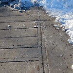 Snow On City-maintained Pathway or Sidewalk at 143 Falworth Wy NE