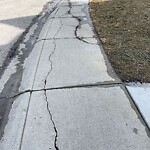 Sidewalk or Curb - Repair at 125 Cramond Cl SE