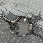 Pothole Repair at 520 58 Av SW