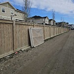 Debris on Backlane at 243 Skyview Point Rd, Calgary, Ab T3 N 1 B6, Canada