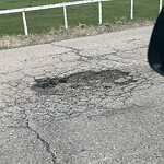 Pothole Repair at 21825 Macleod Tr SW