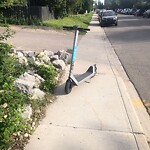 E-Scooter  - Abandoned / Parking Concerns at 240 12 St NE