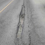 Road Repair at 175 Taravista Dr Ne, Calgary, Ab T3 J 4 T2, Canada