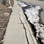 Sidewalk or Curb - Repair at 82 Sundown Mr SE