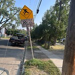 Sign on Street, Lane, Sidewalk - Repair or Replace at 598 12 St NW