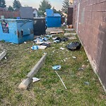 Debris on Backlane at 3711 49 St NE