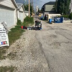 Debris on Backlane at 1625 11 Av SW