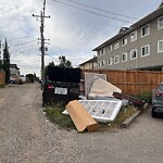 Debris on Backlane at 1702 37 St SE