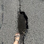 Pothole Repair at 6039 Thorncliffe Dr NW