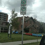 Sign on Street, Lane, Sidewalk - Repair or Replace at 1124 14 Av SW