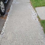 Sidewalk or Curb - Repair at 2026 37 Av SW