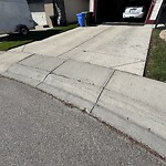 Sidewalk or Curb - Repair at 306 Covewood Cir NE Coventry Hills