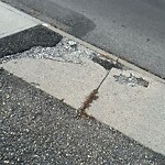 Sidewalk or Curb - Repair at 112 14 Av NW