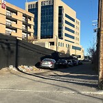 Debris on Backlane at 2231 Banff Tr NW