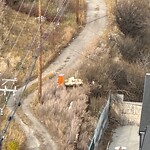 Debris on Backlane at 4515 Macleod Tr SW