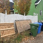 Debris on Backlane at 1209 16 St SW