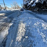 Snow On City Road at 723 8 Av NE