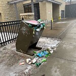 Debris on Street, Sidewalk, Boulevard at 202 14 Av SW