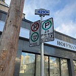 Sign on Street, Lane, Sidewalk - Repair or Replace at 105 14 Av SE