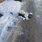 Debris on Backlane at 2503 6 St NE