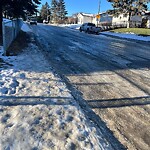 Snow On City Road at 908 Stonehaven Rd SW