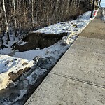 Sidewalk or Curb - Repair at 424 Aspen Glen Pl SW