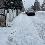 Snow On City - Maintained Sidewalk at 3543 33 St SE