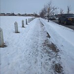 Snow On City - Maintained Sidewalk at 330 Prestwick Ci SE