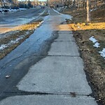 Snow On City - Maintained Sidewalk at 379 Arbour Lake Wy NW