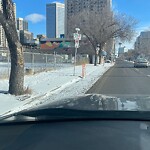 Sign on Street, Lane, Sidewalk - Repair or Replace at 1032 9 Av SW