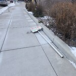 Sign on Street, Lane, Sidewalk - Repair or Replace at 1313 10 Av SW