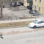 Debris on Street, Sidewalk, Boulevard at 715 14 Av SW