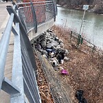 Debris on Street, Sidewalk, Boulevard at 304 26 Av SW