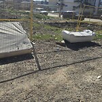 Debris on Backlane at 3522 16 Av SE