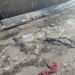 Debris on Backlane at 525 13 Av SW