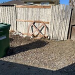 Debris on Backlane at 1154 Falworth Rd NE