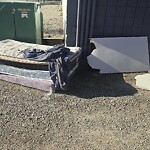 Debris on Backlane at 3466 17 Av SE